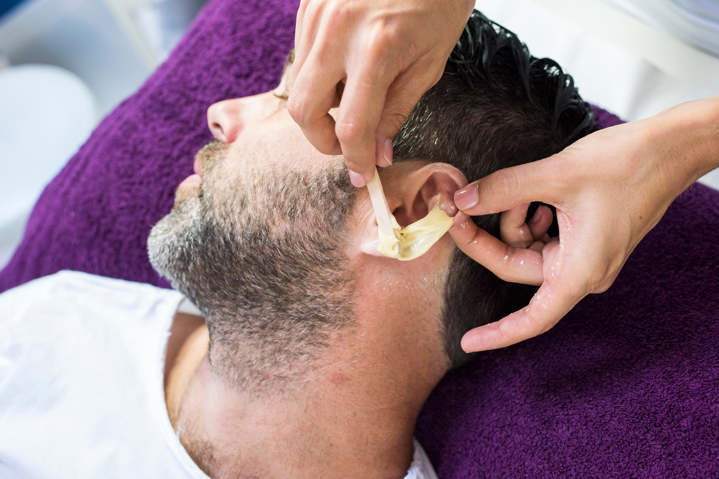 Ear waxing treatment